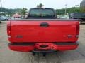 2003 Bright Red Ford F150 STX SuperCab 4x4  photo #3