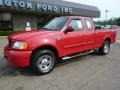 2003 Bright Red Ford F150 STX SuperCab 4x4  photo #6