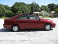 2003 Salsa Red Pearl Toyota Camry LE  photo #8