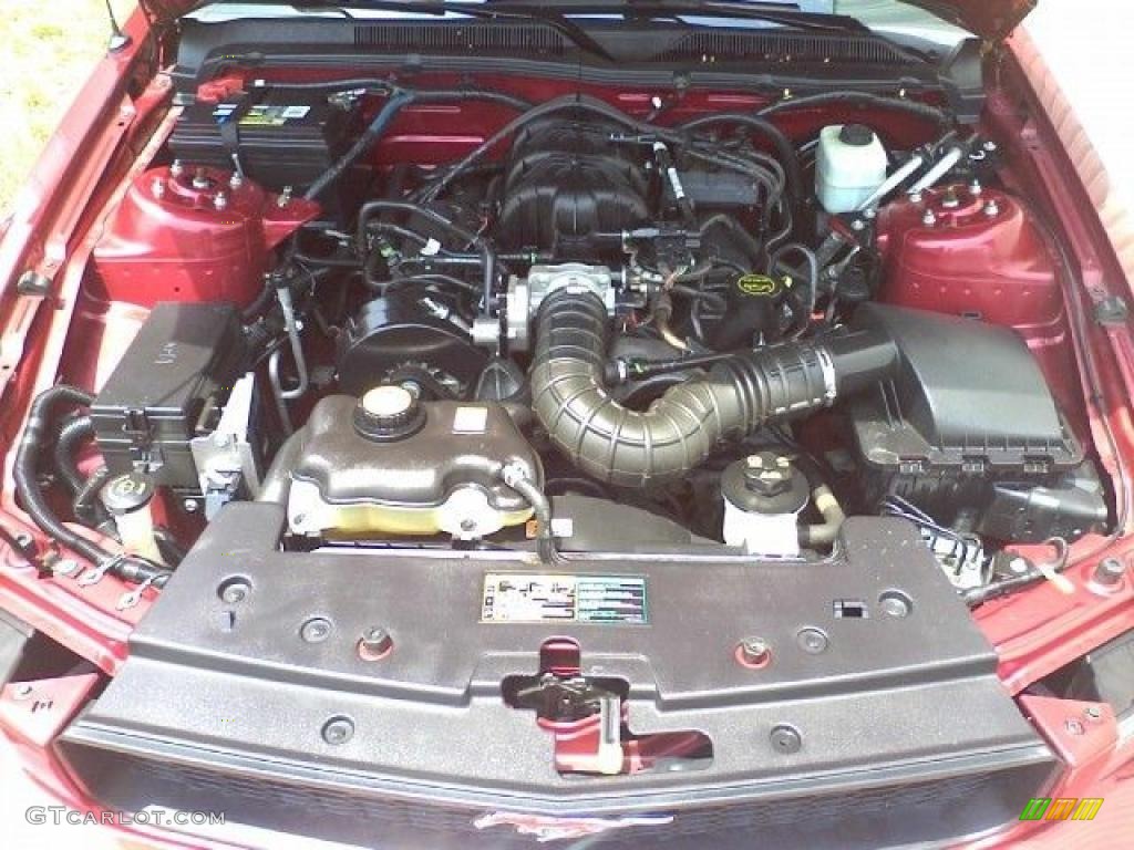 2005 Mustang V6 Premium Coupe - Redfire Metallic / Medium Parchment photo #19