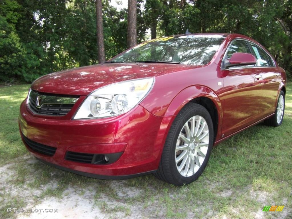 2009 Aura XR V6 - Red Jewel Tintcoat / Black photo #2