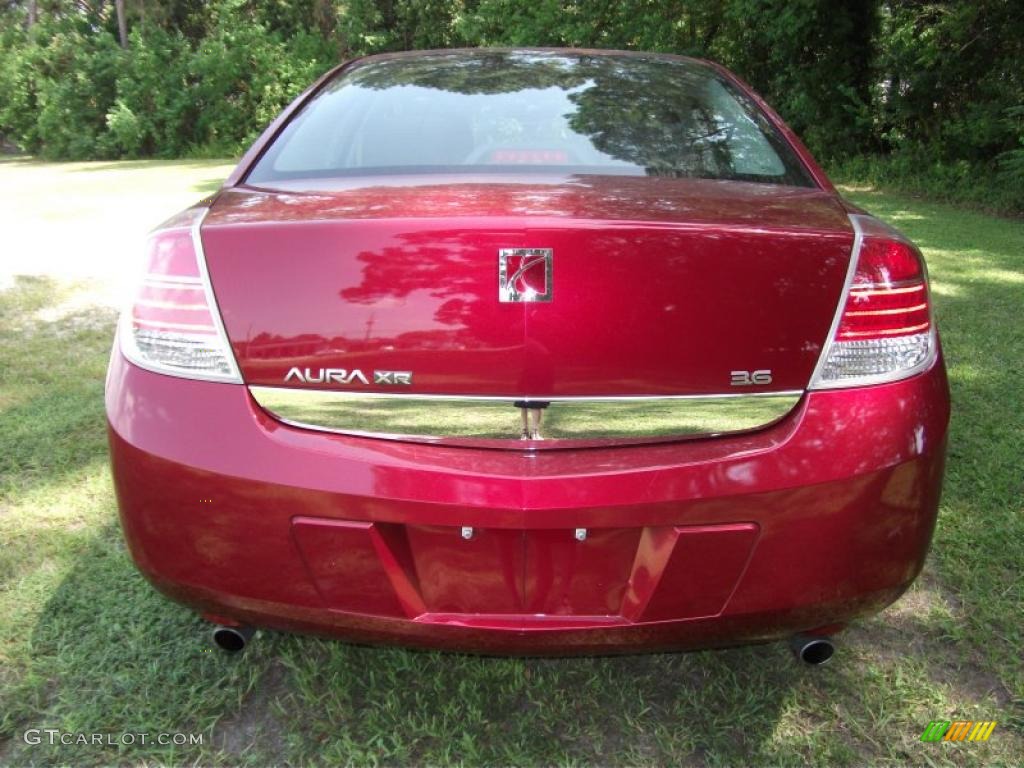 2009 Aura XR V6 - Red Jewel Tintcoat / Black photo #3