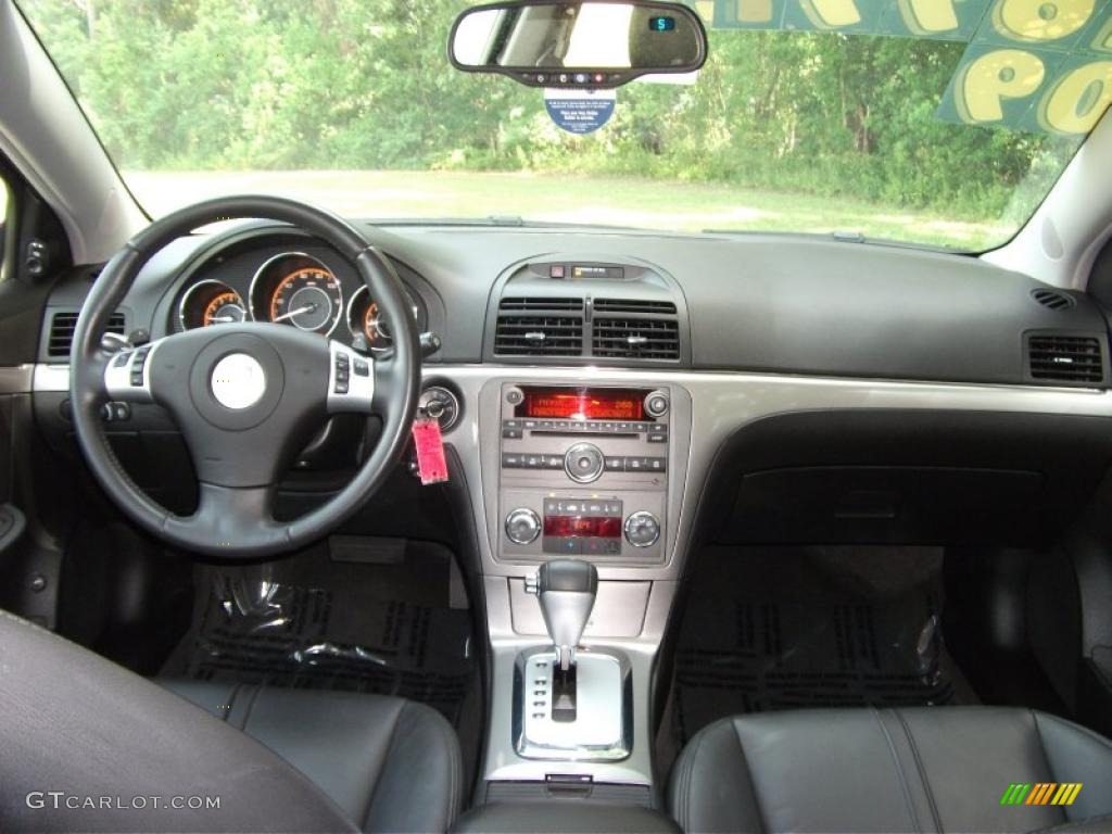 2009 Aura XR V6 - Red Jewel Tintcoat / Black photo #9