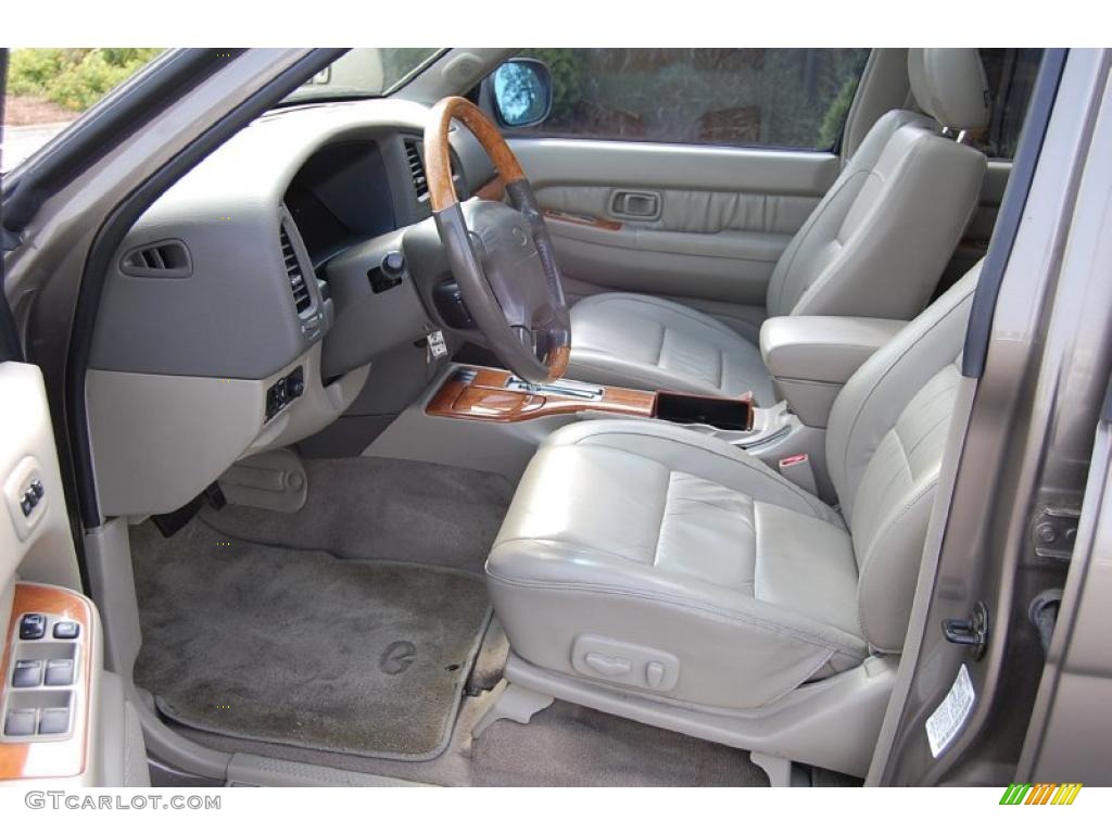 2001 QX4  - Bronze Metallic / Stone Beige photo #5