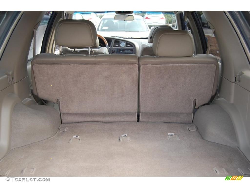 2001 QX4  - Bronze Metallic / Stone Beige photo #9