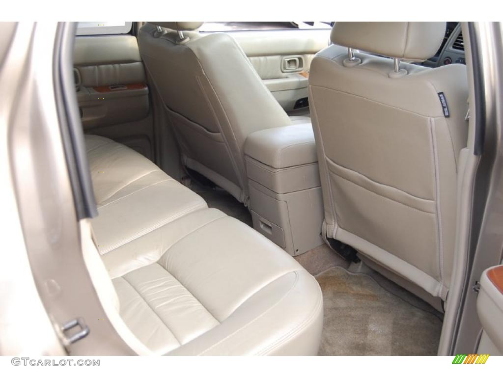 2001 QX4  - Bronze Metallic / Stone Beige photo #10
