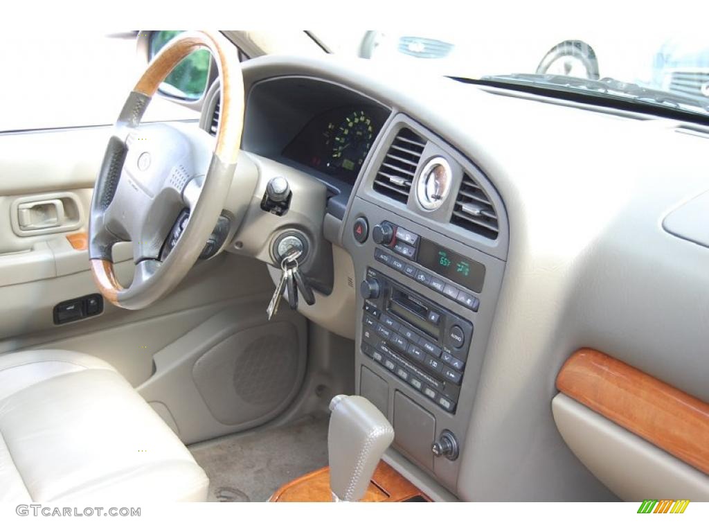 2001 QX4  - Bronze Metallic / Stone Beige photo #11
