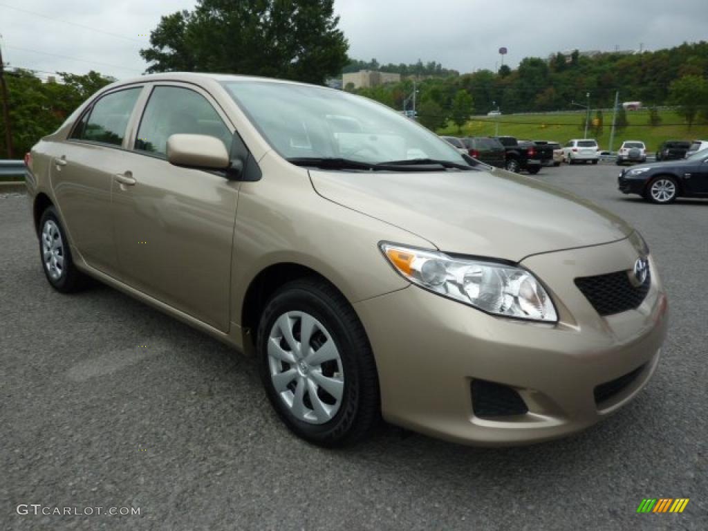 Desert Sand Metallic Toyota Corolla