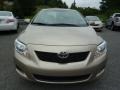 2010 Desert Sand Metallic Toyota Corolla LE  photo #2