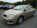 2010 Desert Sand Metallic Toyota Corolla LE  photo #3