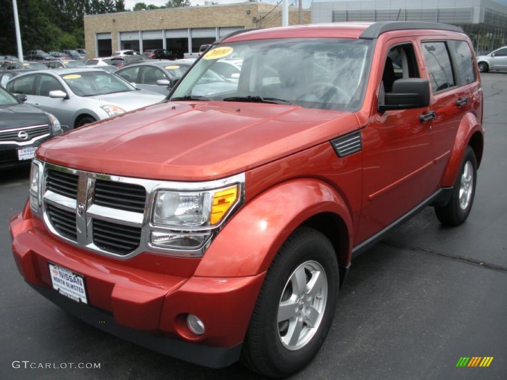 2009 Nitro SE 4x4 - Sunburst Orange Pearl / Dark Slate Gray/Light Slate Gray photo #1