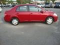 2009 Red Brick Nissan Versa 1.8 S Sedan  photo #6