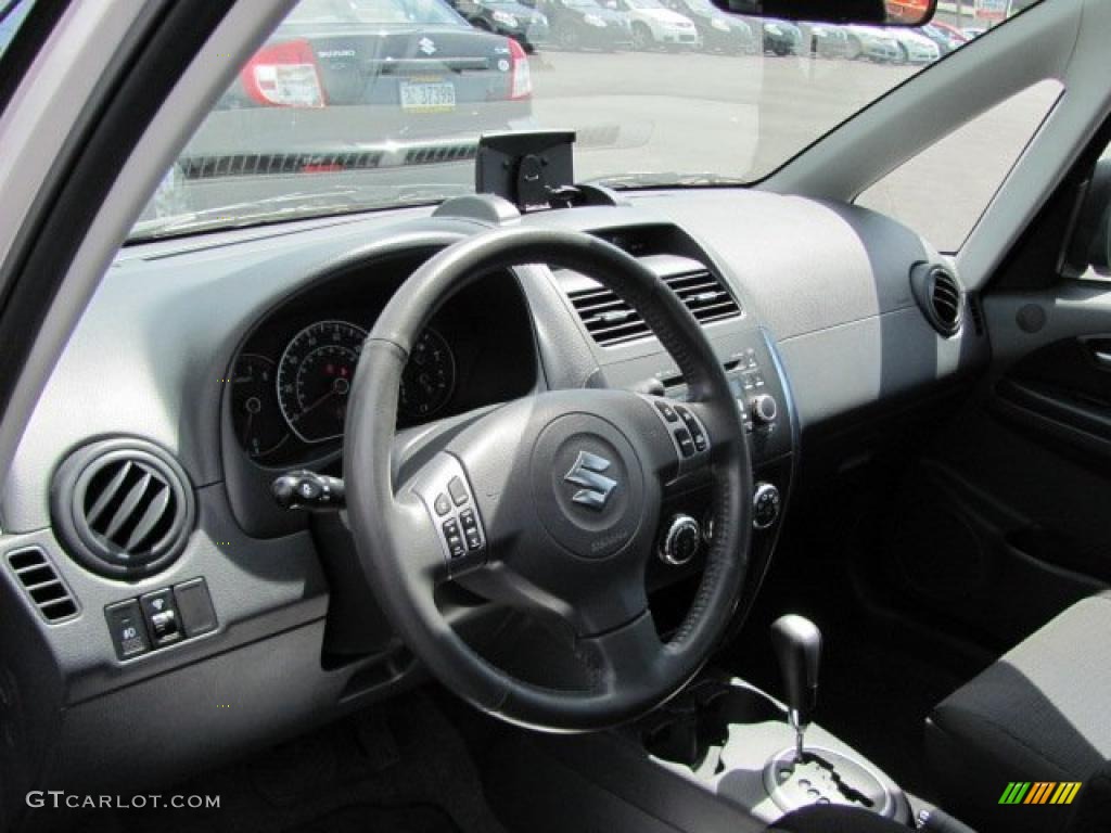 2009 SX4 Touring Sport Sedan - Quicksilver Metallic / Black photo #8