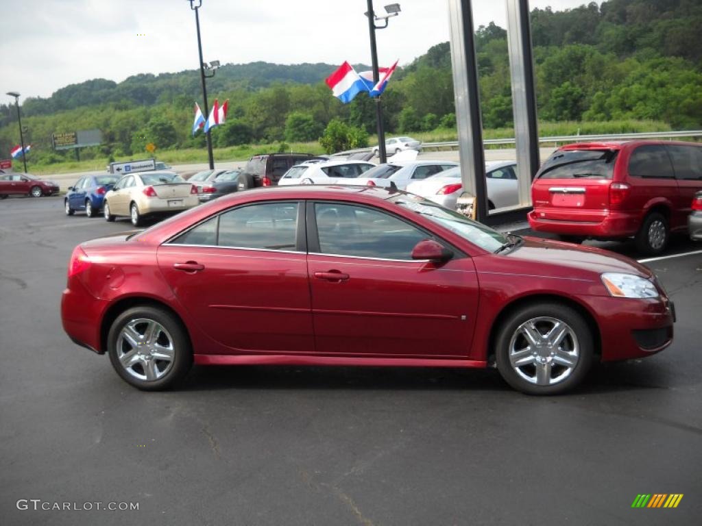 2009 G6 Sedan - Performance Red Metallic / Ebony photo #4