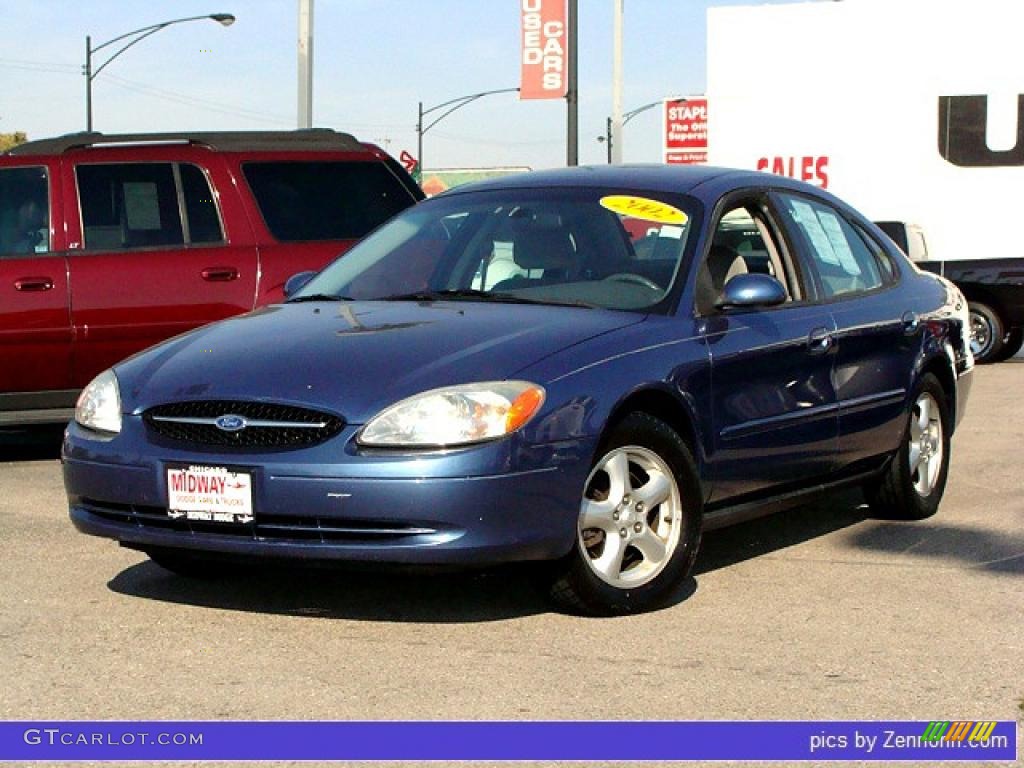 Medium Royal Blue Metallic Ford Taurus