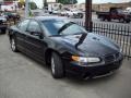 1999 Black Pontiac Grand Prix GT Sedan  photo #7