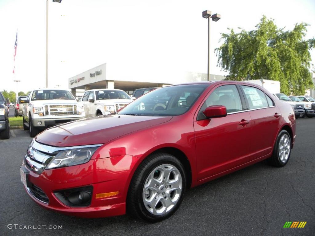 2010 Fusion SE - Red Candy Metallic / Medium Light Stone photo #6