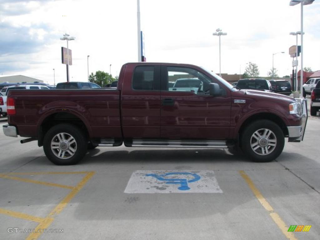 2005 F150 Lariat SuperCab 4x4 - Dark Toreador Red Metallic / Black photo #14