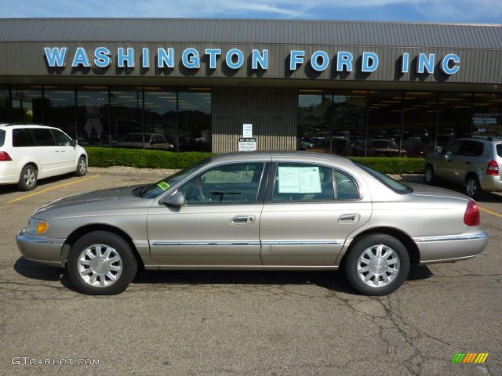 Light Parchment Gold Metallic Lincoln Continental