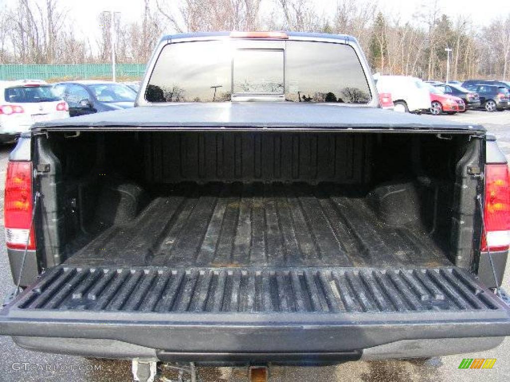 2005 Titan SE King Cab 4x4 - Smoke Gray / Graphite/Titanium photo #21