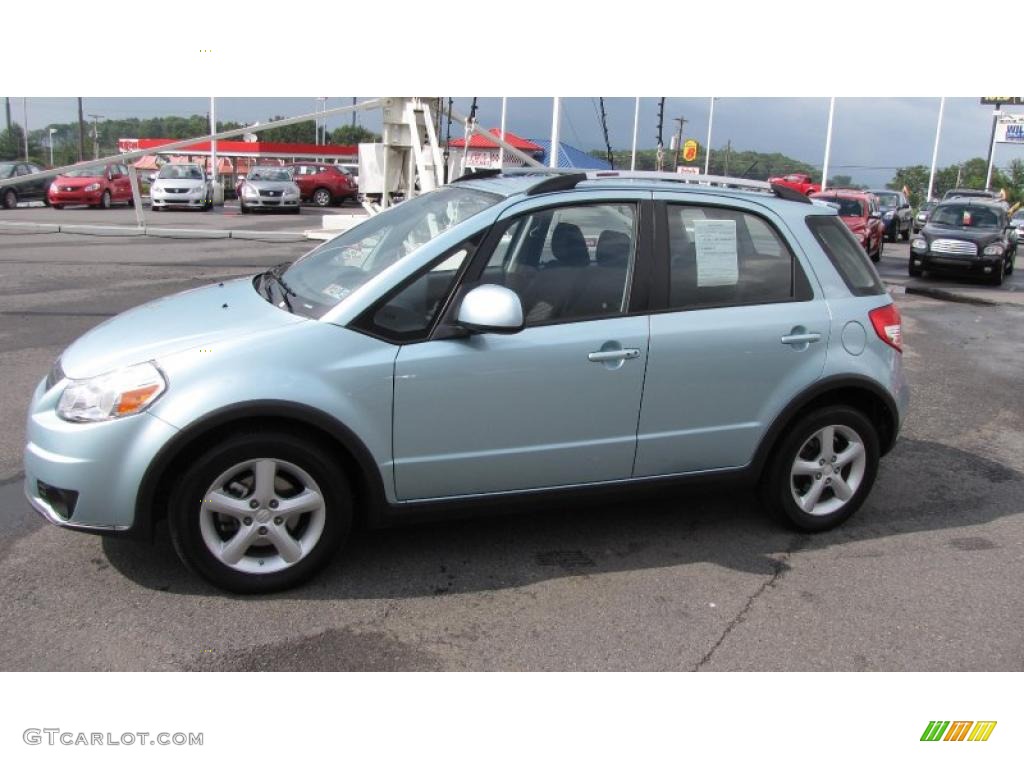 2009 SX4 Crossover Touring AWD - Vapor Blue Metallic / Black photo #1