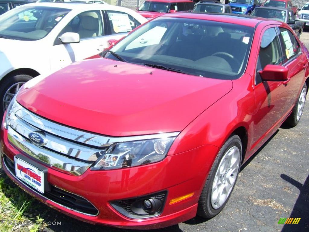 2010 Fusion SE - Red Candy Metallic / Charcoal Black photo #1