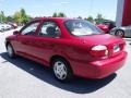 2001 Classic Red Kia Sephia   photo #3