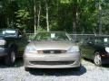 2003 Arizona Beige Metallic Ford Focus SE Sedan  photo #2