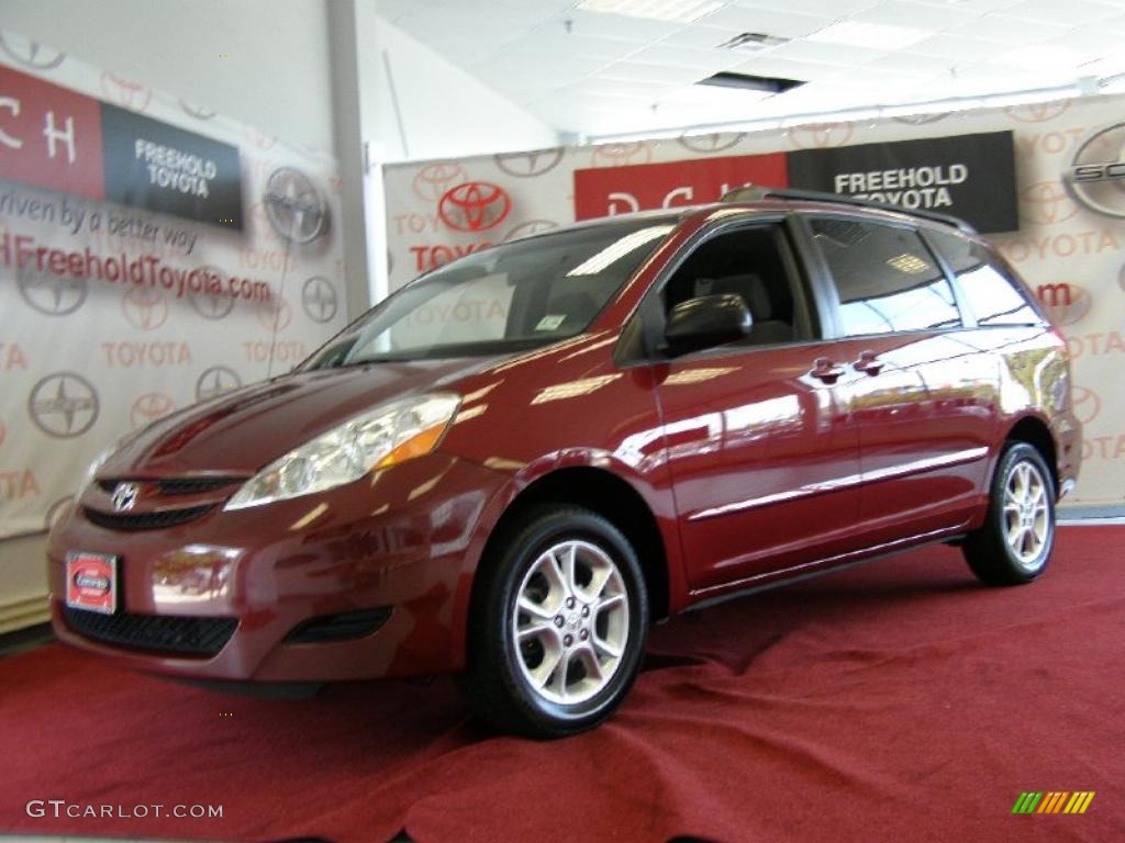 2006 Sienna LE AWD - Salsa Red Pearl / Stone Gray photo #1