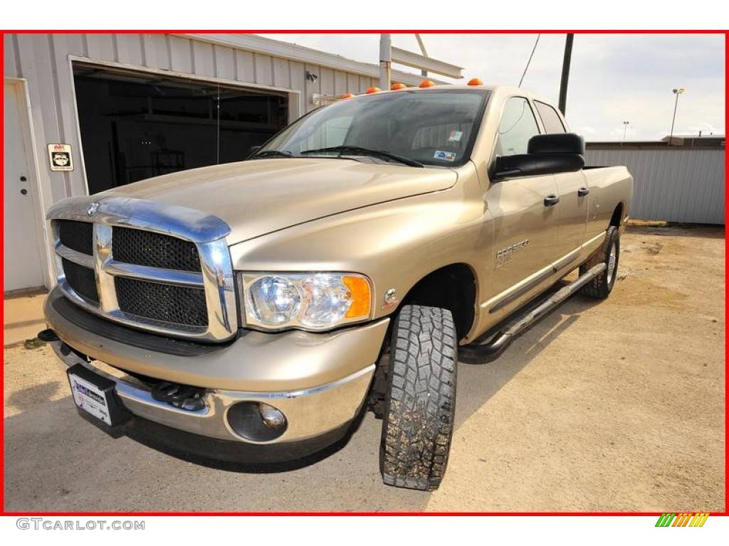 2005 Ram 3500 SLT Quad Cab 4x4 - Light Almond Pearl Metallic / Taupe photo #1