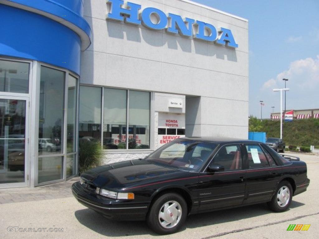 1992 Cutlass Supreme S Sedan - Black / Dark Red photo #1