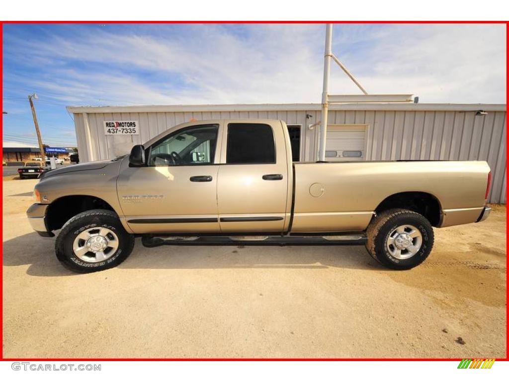 2005 Ram 3500 SLT Quad Cab 4x4 - Light Almond Pearl Metallic / Taupe photo #2