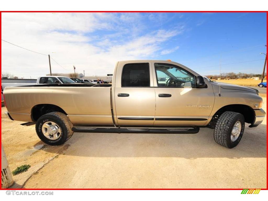 2005 Ram 3500 SLT Quad Cab 4x4 - Light Almond Pearl Metallic / Taupe photo #9