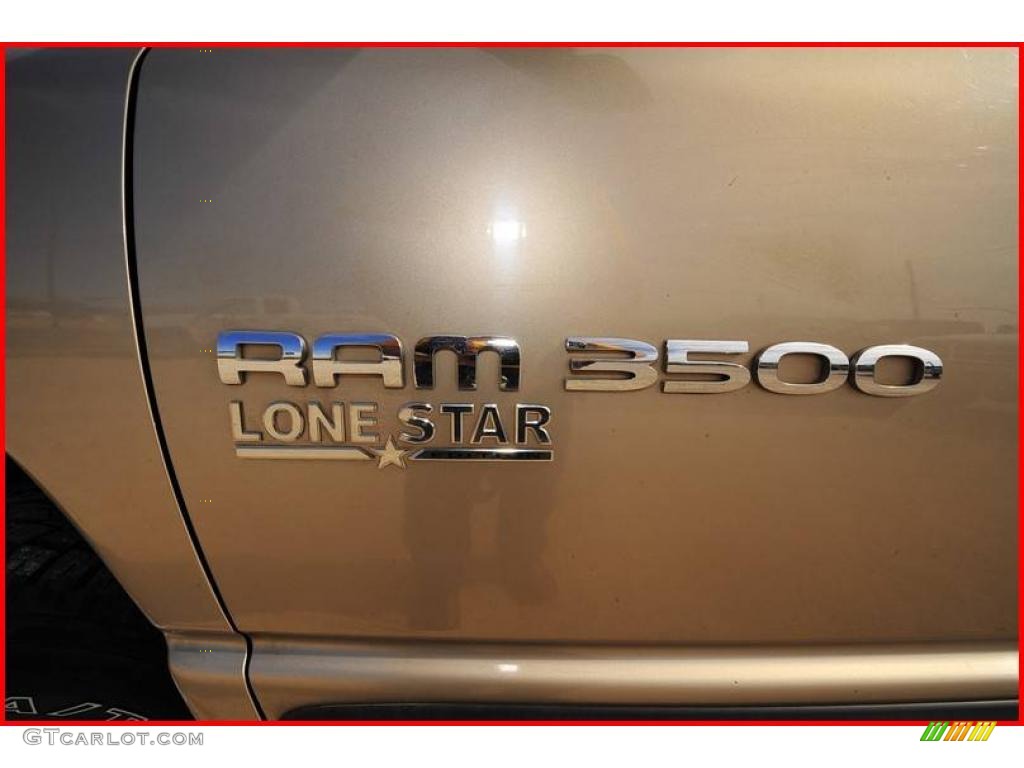 2005 Ram 3500 SLT Quad Cab 4x4 - Light Almond Pearl Metallic / Taupe photo #13