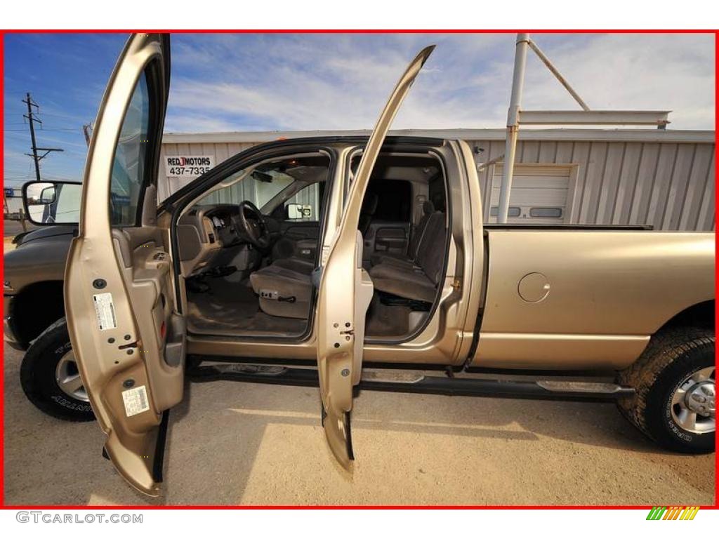 2005 Ram 3500 SLT Quad Cab 4x4 - Light Almond Pearl Metallic / Taupe photo #19