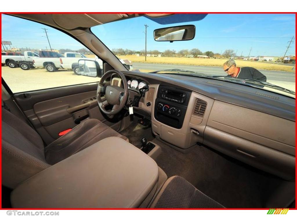 2005 Ram 3500 SLT Quad Cab 4x4 - Light Almond Pearl Metallic / Taupe photo #24