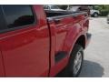 2005 Bright Red Ford F150 STX SuperCab 4x4  photo #11