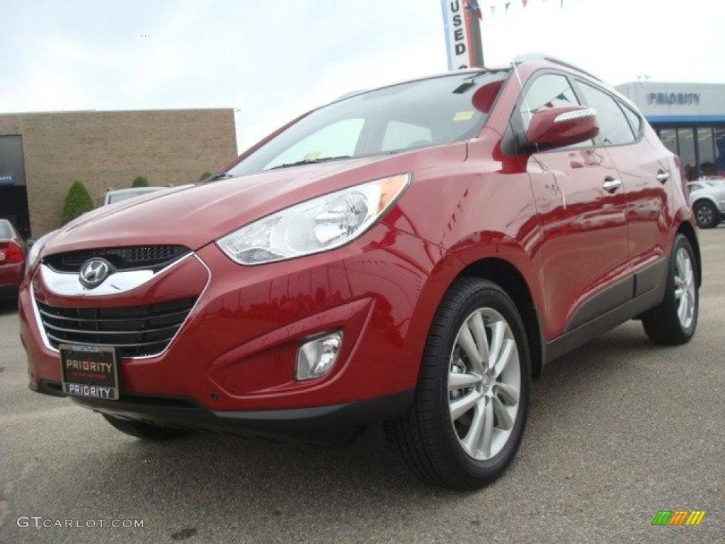 2010 Tucson Limited - Garnet Red / Taupe photo #1
