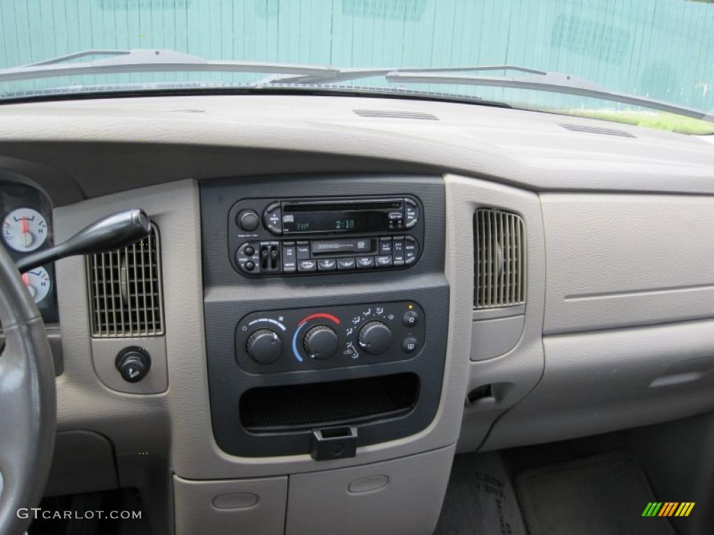 2004 Ram 1500 SLT Quad Cab 4x4 - Bright Silver Metallic / Taupe photo #6