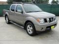 2006 Granite Metallic Nissan Frontier LE Crew Cab  photo #1