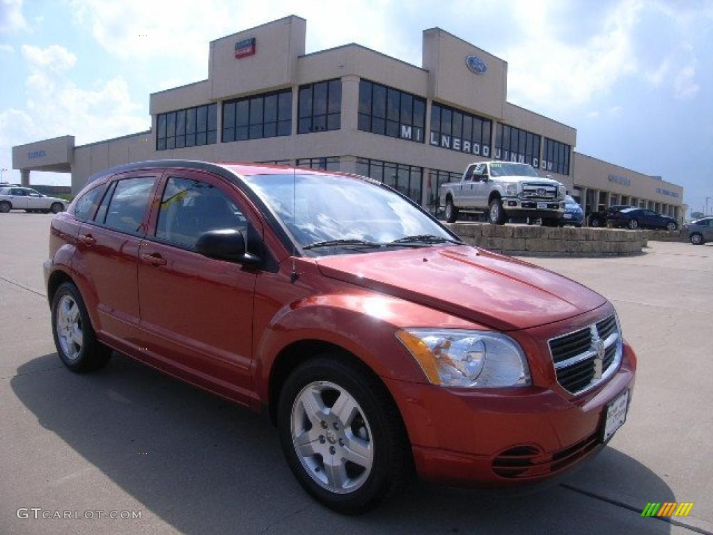 2009 Caliber SXT - Sunburst Orange Pearl / Pastel Pebble Beige photo #1