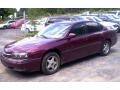 2002 Dark Carmine Red Metallic Chevrolet Impala LS  photo #1