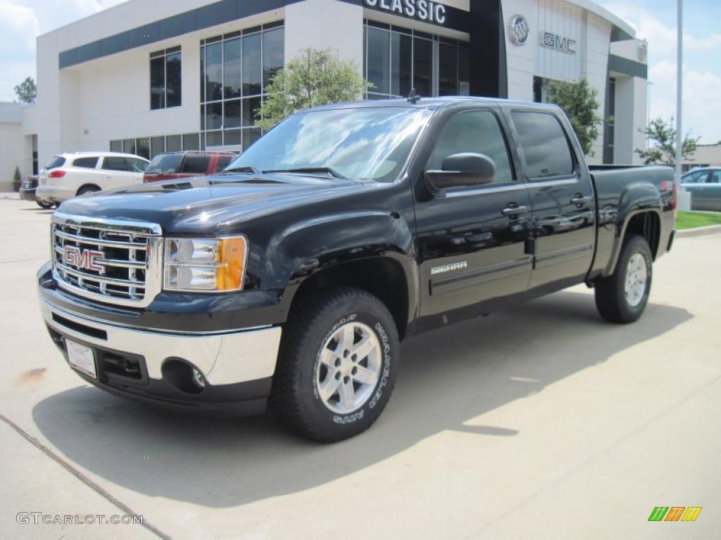 2010 Sierra 1500 SLE Crew Cab 4x4 - Onyx Black / Very Dark Cashmere/Light Cashmere photo #1