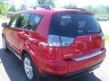 2010 Rally Red Metallic Mitsubishi Outlander SE 4WD  photo #10