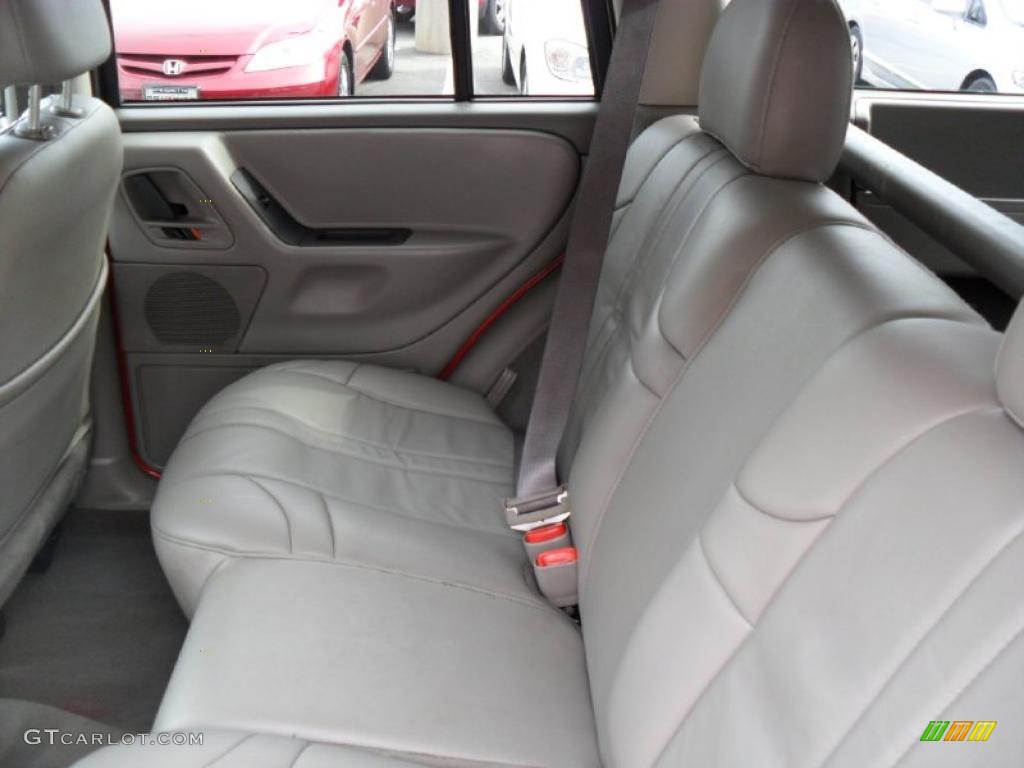 2003 Grand Cherokee Laredo 4x4 - Inferno Red Tinted Pearlcoat / Taupe photo #16