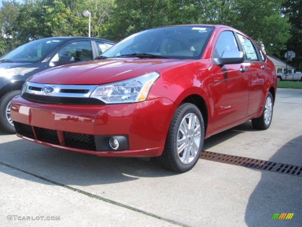 2011 Focus SEL Sedan - Sangria Red Metallic / Medium Stone photo #1