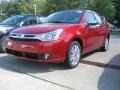 2011 Sangria Red Metallic Ford Focus SEL Sedan  photo #1