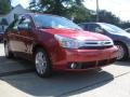 2011 Sangria Red Metallic Ford Focus SEL Sedan  photo #3