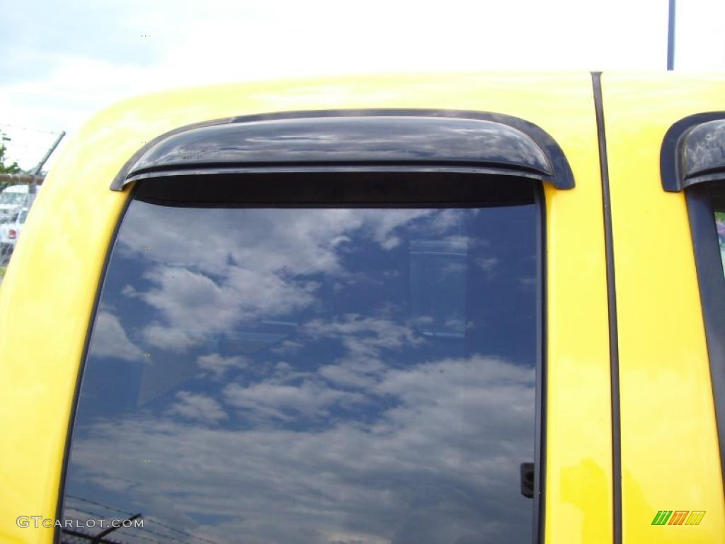 2004 Colorado LS Extended Cab 4x4 - Yellow / Medium Dark Pewter photo #8