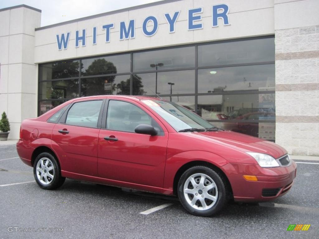 2005 Focus ZX4 SE Sedan - Sangria Red Metallic / Dark Flint/Light Flint photo #1